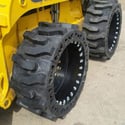aggressive solid skid steer tires
