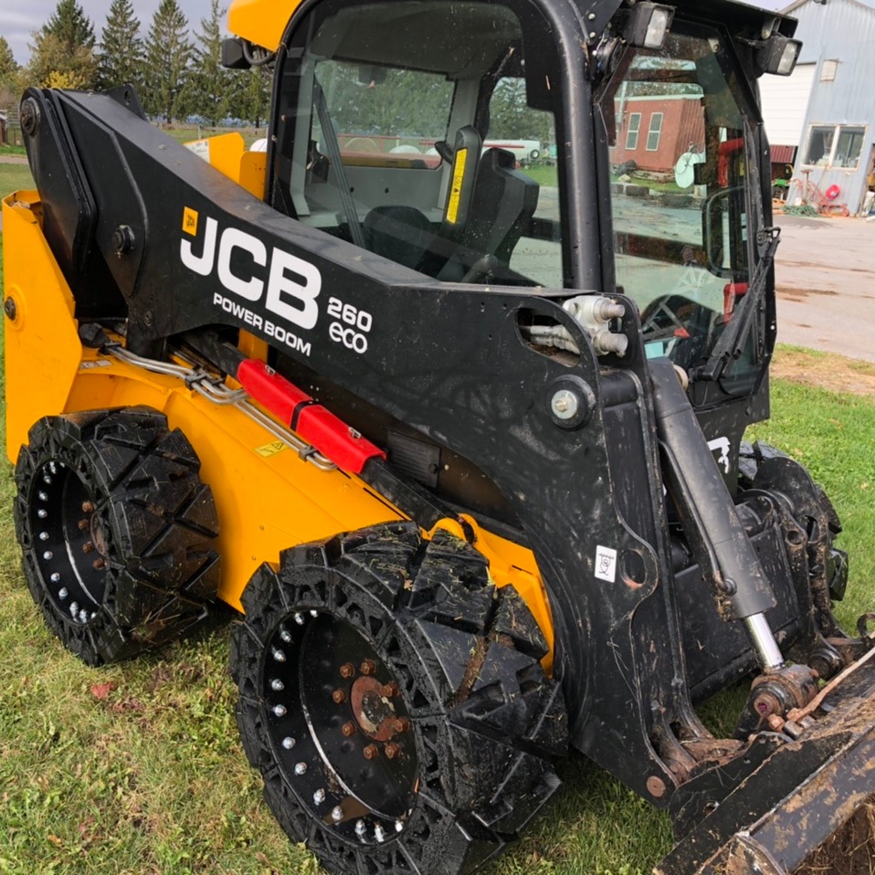 new holland l228 solid skid steer tires