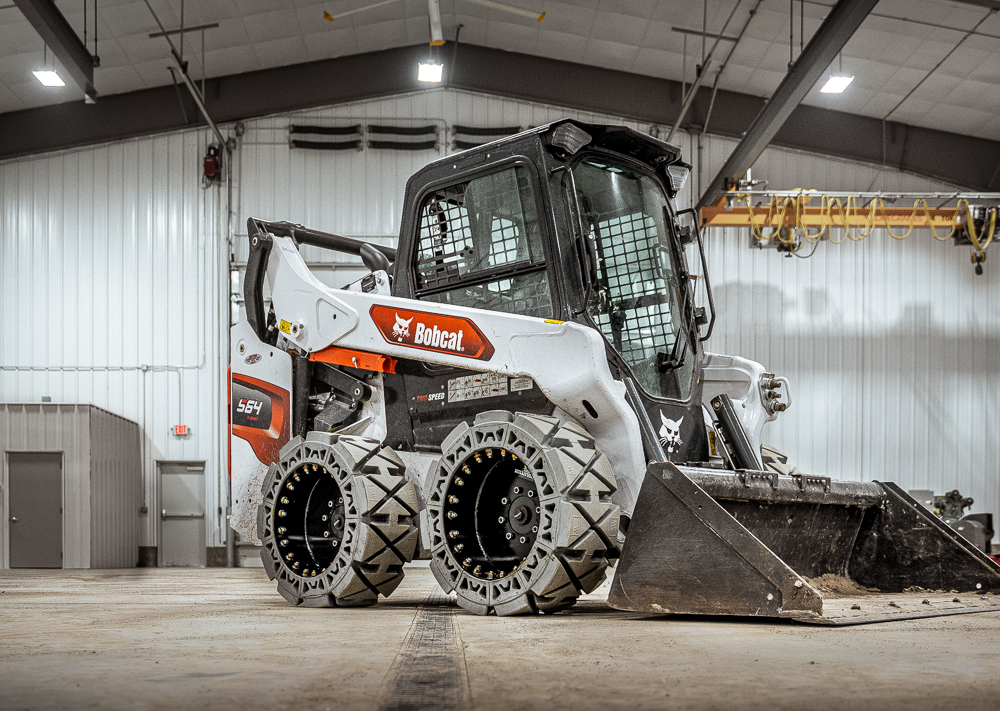 EWRS-HS-NM non marking solid skid steer tires on a Bobcat S64
