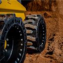 new holland solid skid steer tires