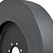 Smooth solid skid steer tire