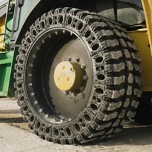 airless john deere 410l rear tire
