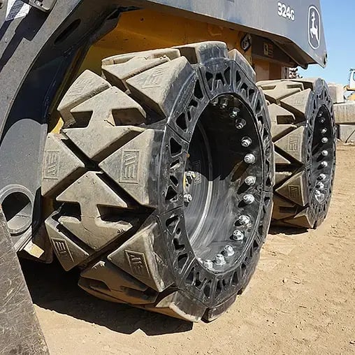 deere 324G solid skid steer tires