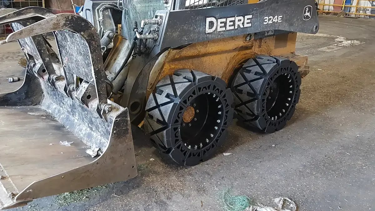 deer 324e solid skid steer tires