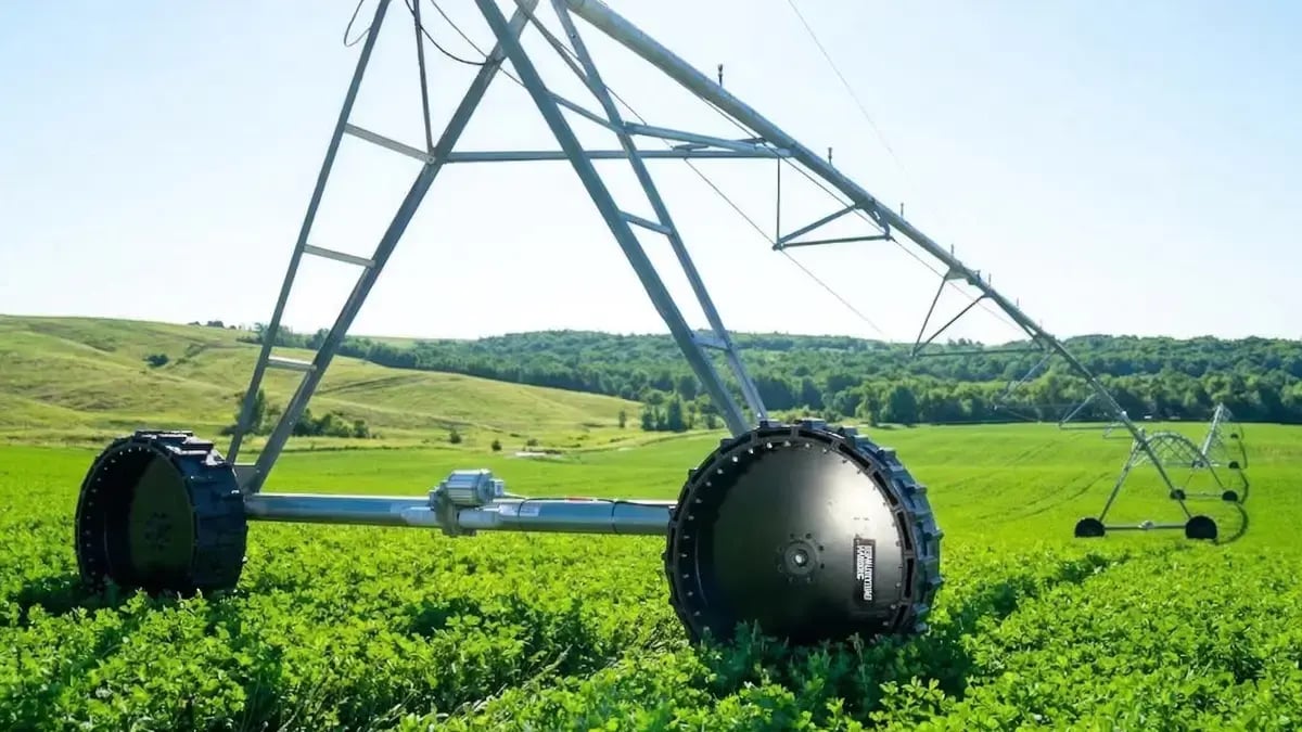 Heavy duty airless irrigation wheels supporting a long span pivot system to ensure continuous water delivery across various crop types.