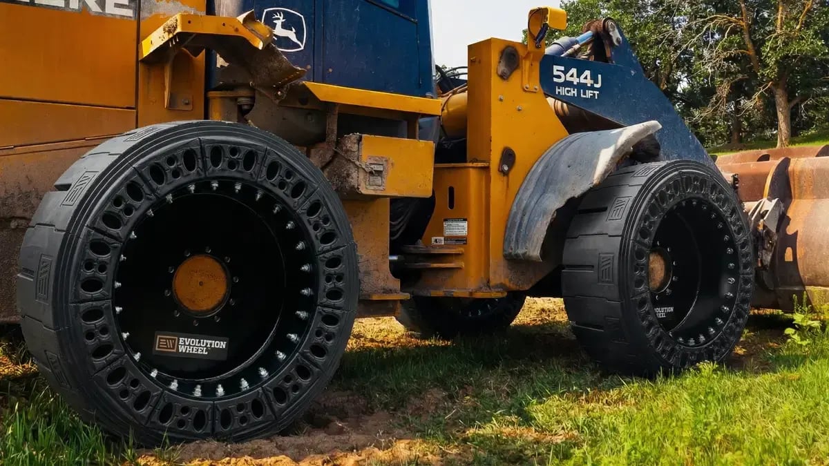 slick tread airless wheel loader tires on 544J