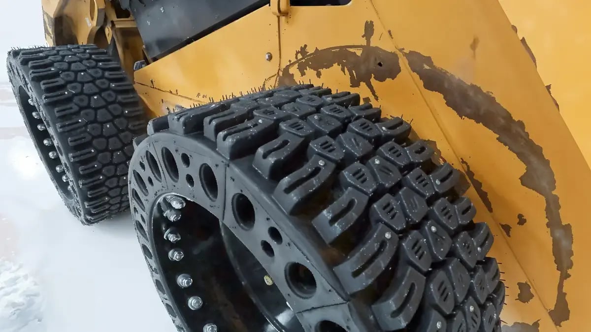 studded solid snow skid steer tire 